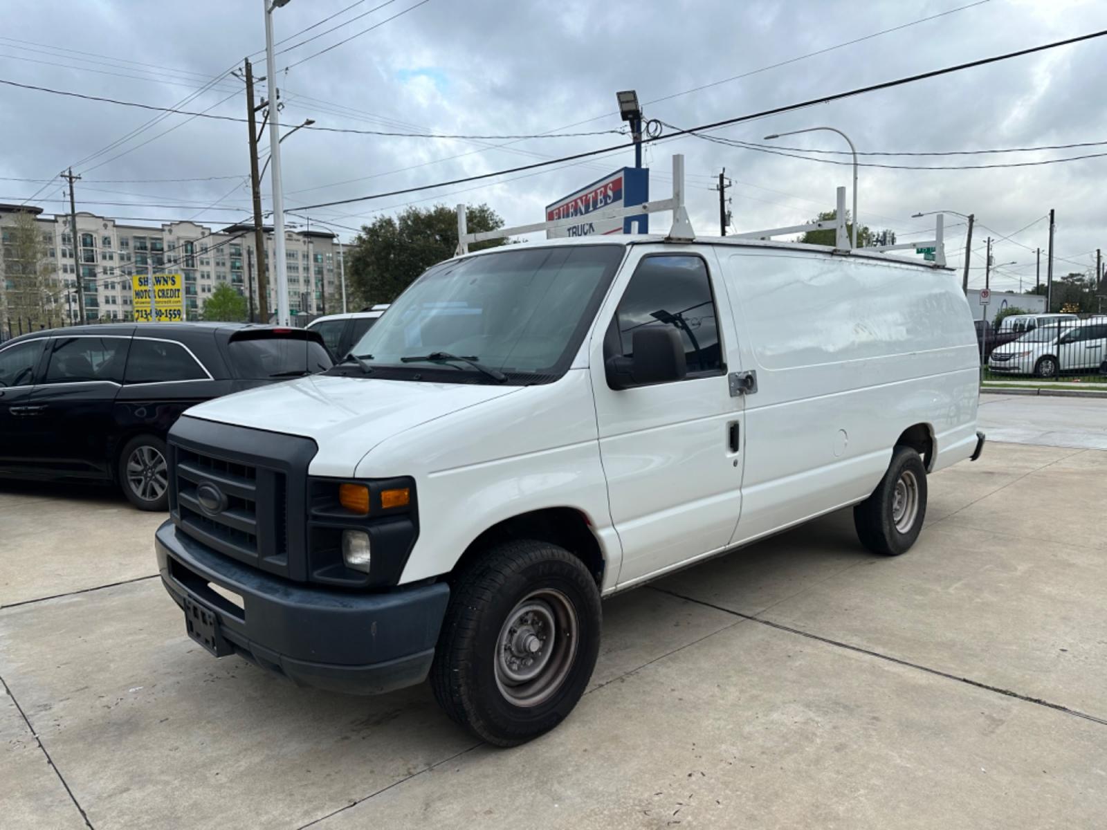 2014 White /Gray Ford E-Series Van E-350 Super Duty Extended (1FTSS3EL5ED) with an 5.4L V8 SOHC 16V FFV engine, 6-Speed Automatic transmission, located at 1501 West 15th St., Houston, 77008, (713) 869-2925, 29.797941, -95.411789 - Photo #0